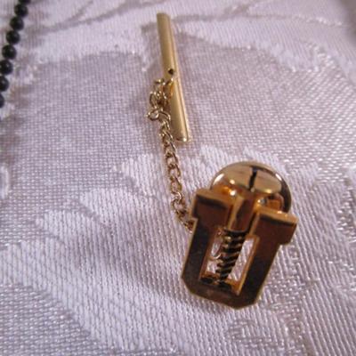 7 ID chains, 2 tassels, pins, cross, key chains