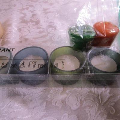 Various candles, 1 large candle holder