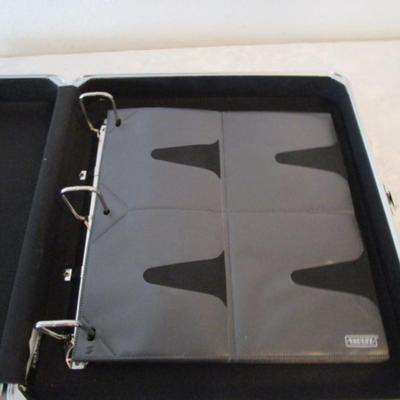 CD/DVD suitcase, with 15 pages of 8 sleeves