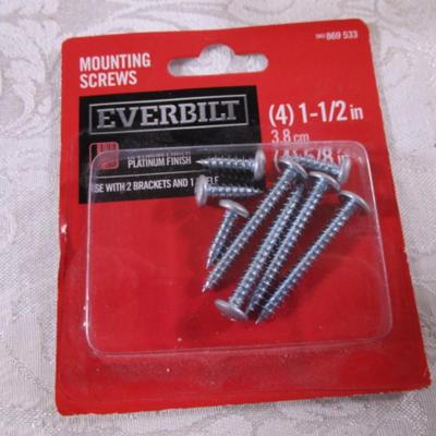 Various sizes of screws and 3 window latches with screws