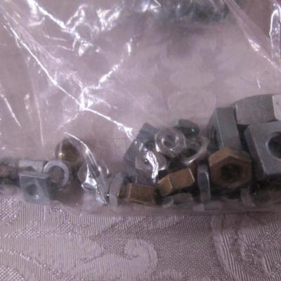Various sizes of screws and 3 window latches with screws