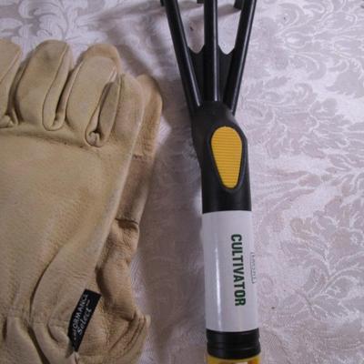 Leather gloves, safety glasses, trowel, cultivator
