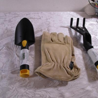 Leather gloves, safety glasses, trowel, cultivator