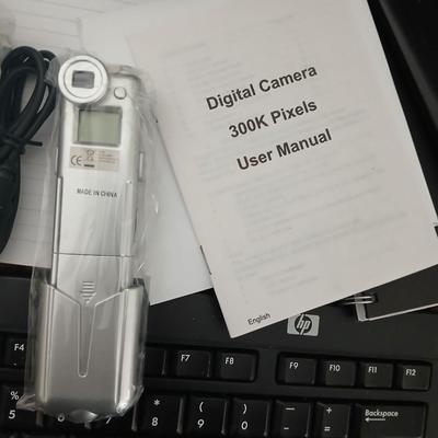 Amazon Kindle, Computer cords, and accessories, web camera, and a nice laptop case