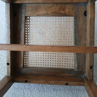 Vintage wicker seat dining room chair and an Afghan shawl