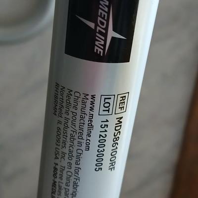 Medical assist shower chair and a toilet safety frame rail both with adjustable legs