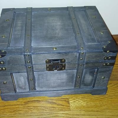 Wooden storage box with photo albums and picture frames