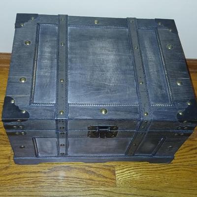 Wooden storage box with photo albums and picture frames