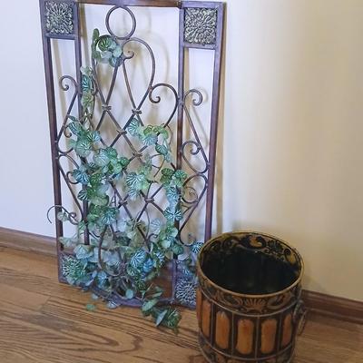 Metal wall art with a metal trash can