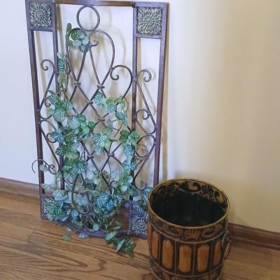 Metal wall art with a metal trash can