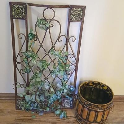 Metal wall art with a metal trash can