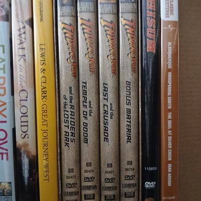 Assortment of movies on DVD - western - chic flicks - and more
