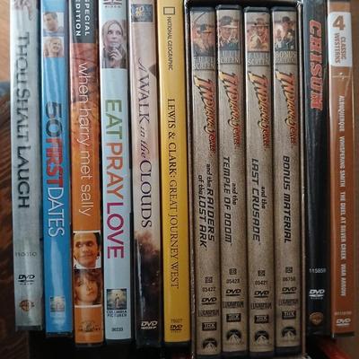 Assortment of movies on DVD - western - chic flicks - and more