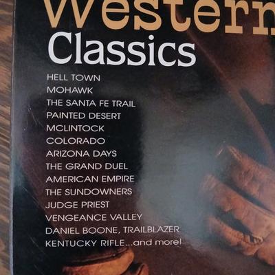 Assortment of movies on DVD - western - chic flicks - and more