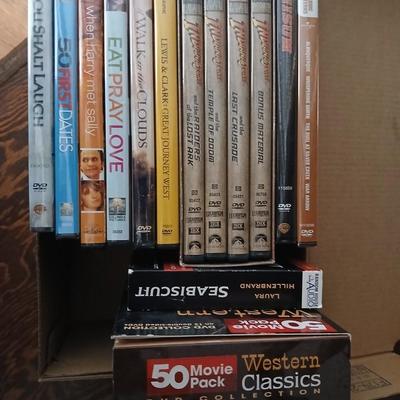 Assortment of movies on DVD - western - chic flicks - and more