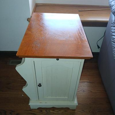 Powell end table with thru door and magazine rack on the side also has pull out extension