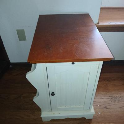 Powell end table with thru door and magazine rack on the side also has pull out extension