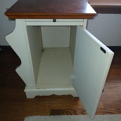 Powell end table with thru door and magazine rack on the side also has pull out extension