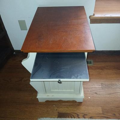 Powell end table with thru door and magazine rack on the side also has pull out extension