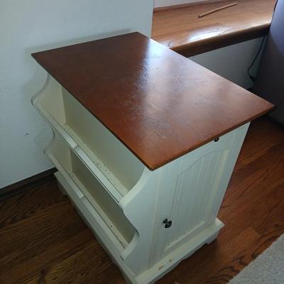 Powell end table with thru door and magazine rack on the side also has pull out extension