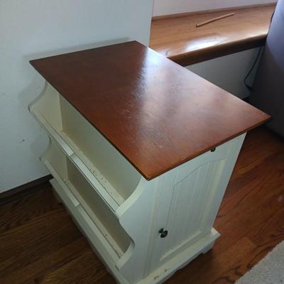 Powell end table with thru door and magazine rack on the side also has pull out extension
