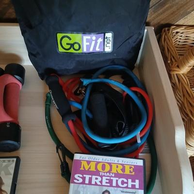 Exercise equipment, stretch bands, hand weights, DVD's and a portable pedal bike