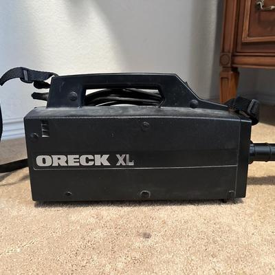 ORECK VACUUM WITH SHOULDER STRAP, EXTRA BAGS, WASTE BASKET