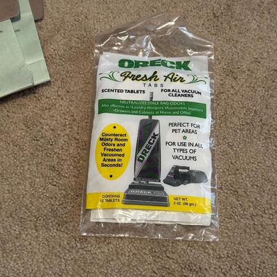 ORECK VACUUM WITH SHOULDER STRAP, EXTRA BAGS, WASTE BASKET