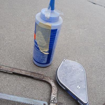 Saws, hammers, and chalk line with chalk