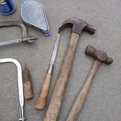 Saws, hammers, and chalk line with chalk