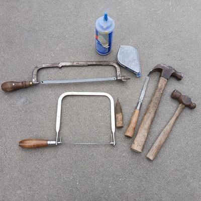 Saws, hammers, and chalk line with chalk