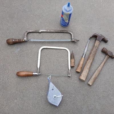 Saws, hammers, and chalk line with chalk