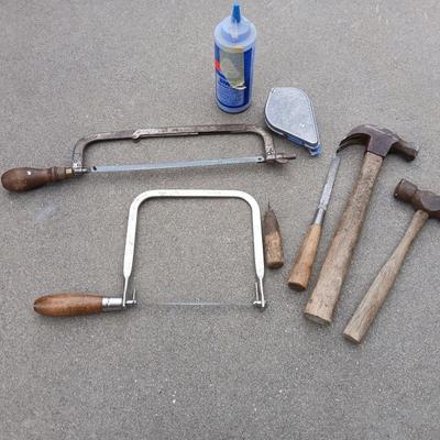 Saws, hammers, and chalk line with chalk