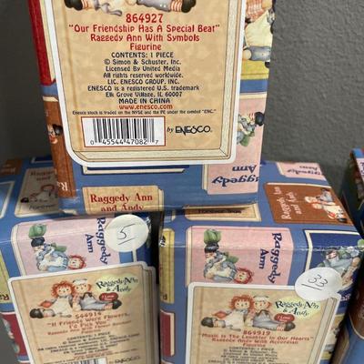 Raggedy Ann and Andy figurines