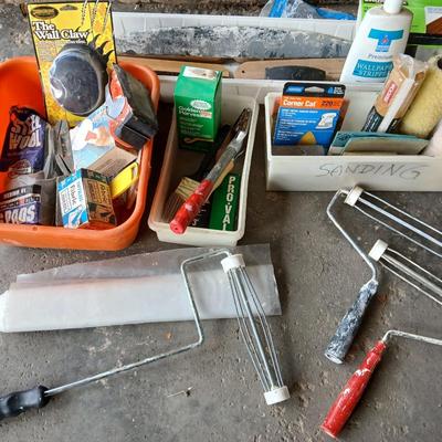 Painting supplies, rollers, brushes, with an assortment of tools to help you paint