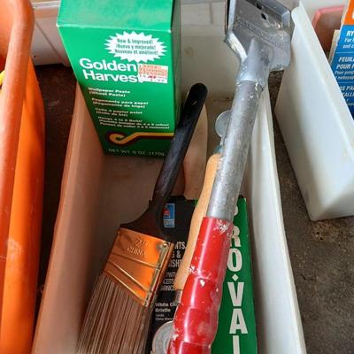 Painting supplies, rollers, brushes, with an assortment of tools to help you paint