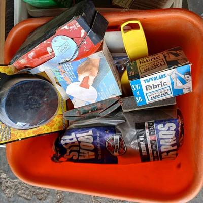 Painting supplies, rollers, brushes, with an assortment of tools to help you paint