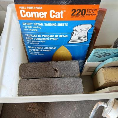 Painting supplies, rollers, brushes, with an assortment of tools to help you paint