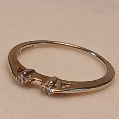 Marked 14 nx? ring with two small stones