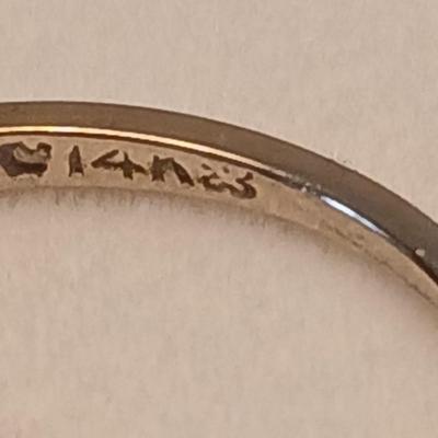 Marked 14 nx? ring with two small stones