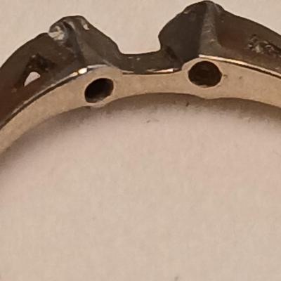 Marked 14 nx? ring with two small stones