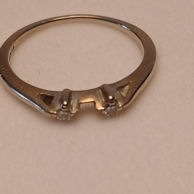 Marked 14 nx? ring with two small stones