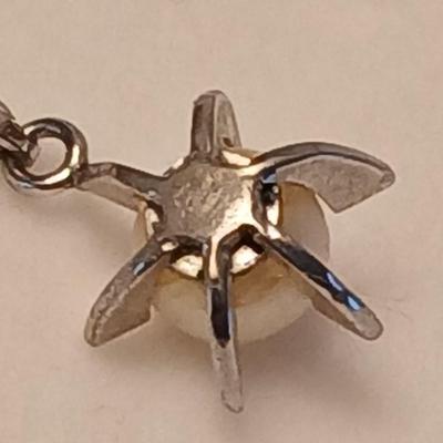 14k marked earrings with pearl like pendant and pearl like pendant on chain