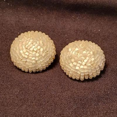 Two fashion necklaces with brooches and earrings