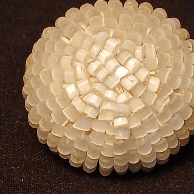 Two fashion necklaces with brooches and earrings