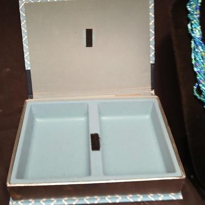 Beaded costume jewelry necklaces and earrings with faux book storage box