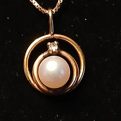 DR 14K Italy Marked chain necklace with pendant and a long pearl like necklace