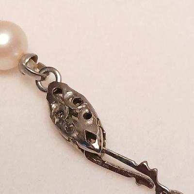 DR 14K Italy Marked chain necklace with pendant and a long pearl like necklace