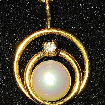 DR 14K Italy Marked chain necklace with pendant and a long pearl like necklace