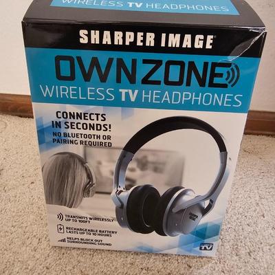 Aiwa Walkman with earphones and cassette tapes